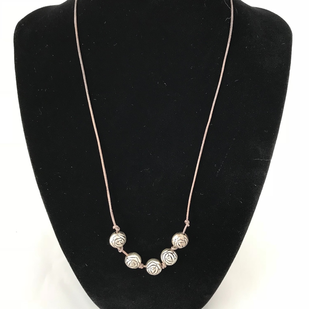 Leather and silver rosebud necklace